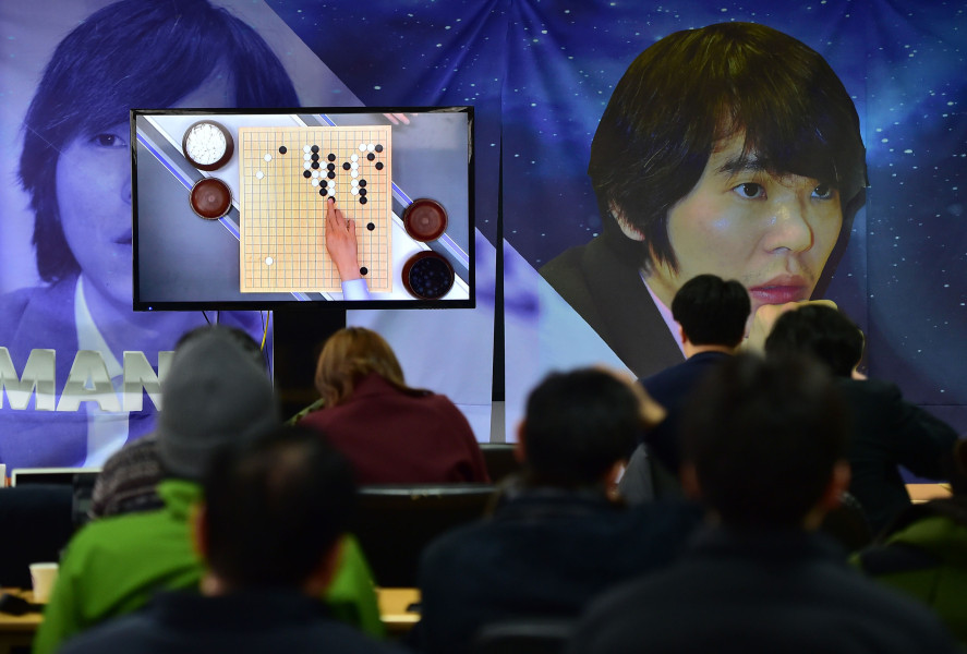 South Korean Go game fans watch a television screen broadcasting live footage of the Google DeepMind Challenge Match, at the Korea Baduk Association in Seoul on March 9, 2016. 
A 3,000-year-old Chinese board game was the focus of a very 21st century showdown as South Korean Go grandmaster Lee Se-Dol kicked off his highly anticipated clash with the Google-developed supercomputer, AlphaGo. / AFP / JUNG YEON-JE        (Photo credit should read JUNG YEON-JE/AFP/Getty Images)