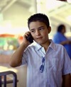 Latino boy on mobile phone