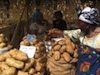 Woman with mobile at market