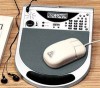 A mouse pad that's also a clock, calculator and fm radio 